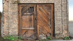 Brick Wall with a large Wooden Gate