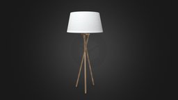 Three-legged floor lamp with white fabric shade