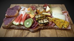 Cold meat, cheese, vegetables and fruit plate